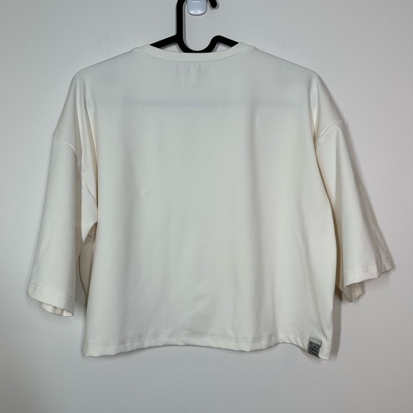 THE Giving Movement Boxy Light SoftSkin100© T-Shirt in Off White Size Small - Picture 7 of 7